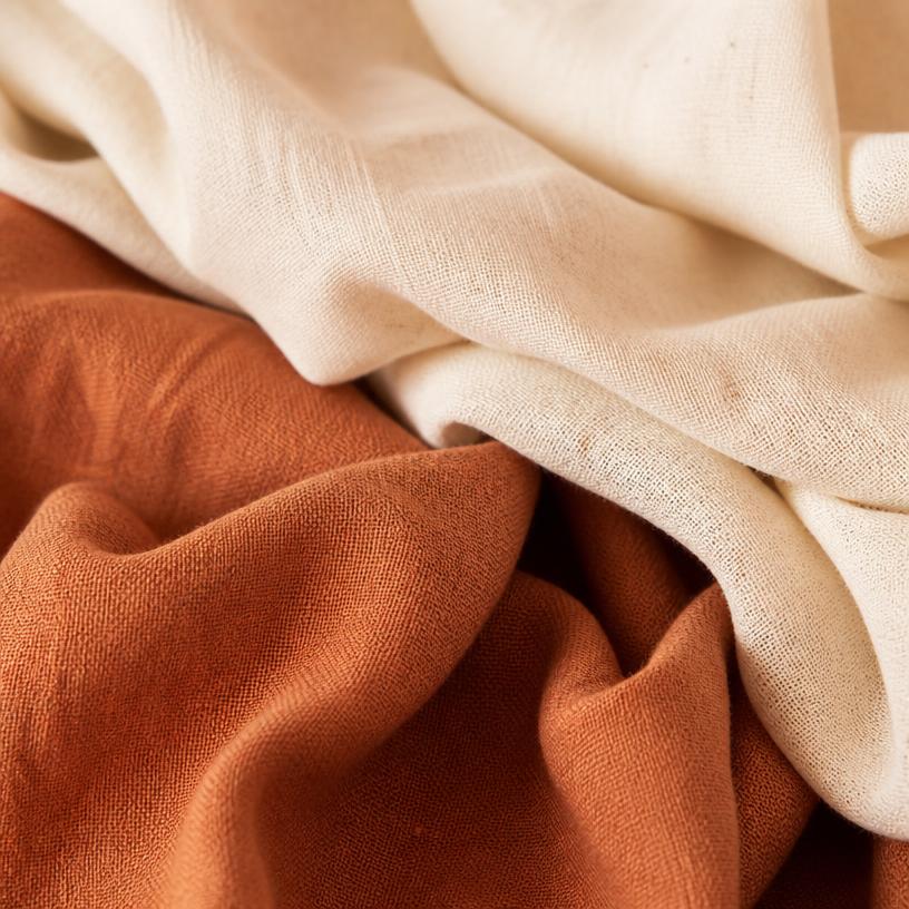 Close-up of soft natural cotton fabric in warm light